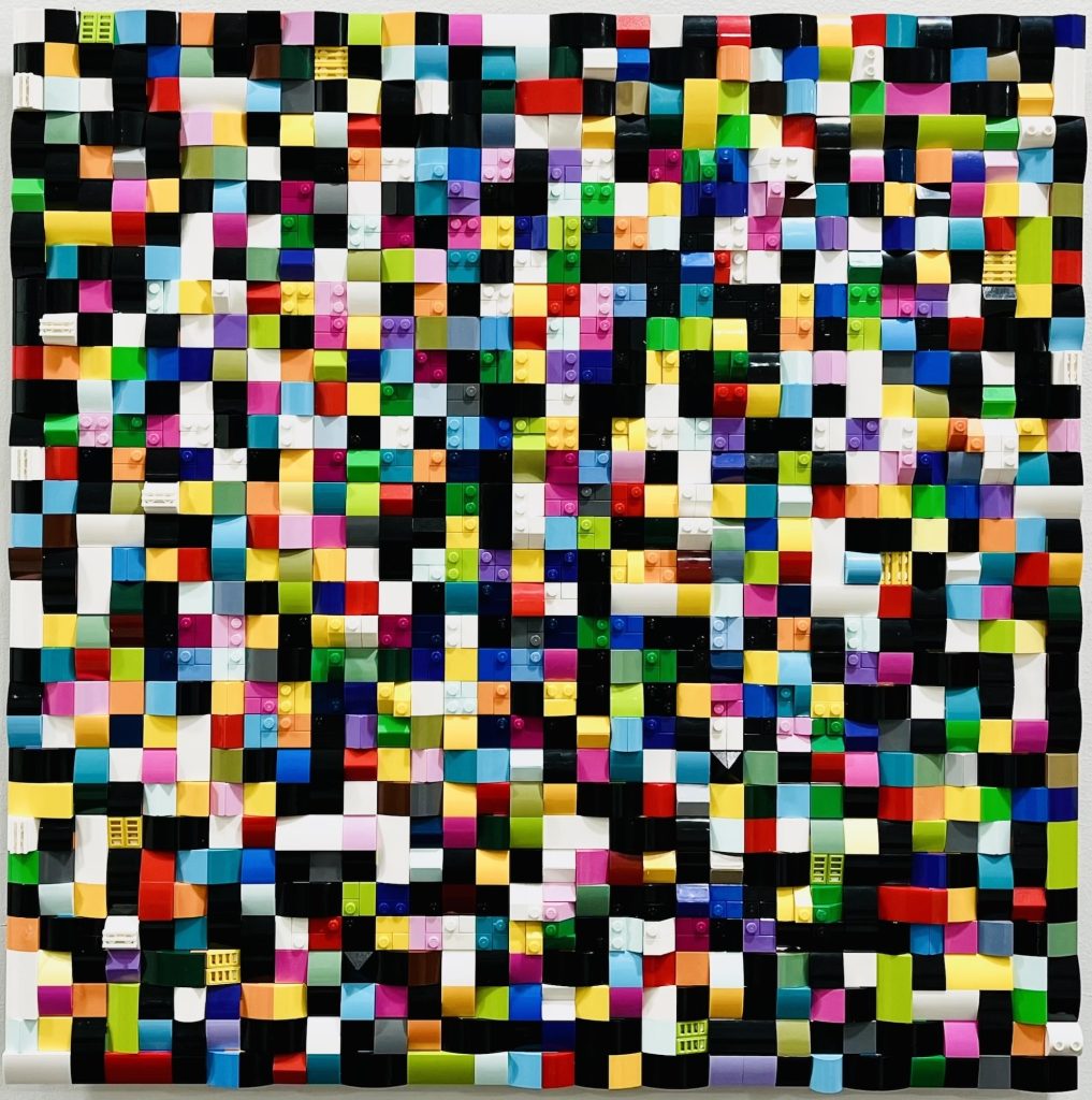 Jaye Moon Fluid Spectrum, 2024 1500 Lego bricks in Braille on plexiglas, aluminum 20 x 20 inches